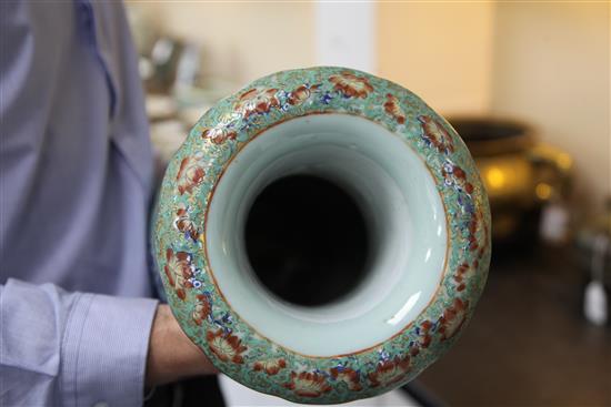 A pair of large Chinese famille rose and underglaze blue celadon ground vases, 19th century, 64cm, restoration to handles